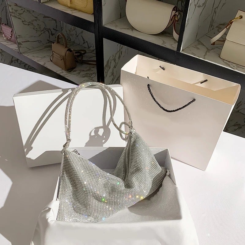 Ring stone clutch bag – Ladies London